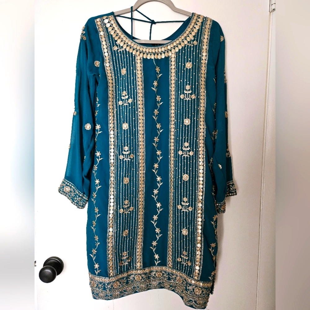 Indian traditional lehnga with long sleeves top with dupatta.